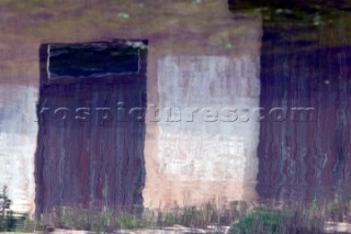 Colourful reflections in water of buildings and architecture in southern France