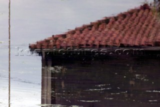 Colourful reflections in water of buildings and architecture in southern France