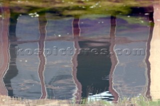 Colourful reflections in water of buildings and architecture in southern France