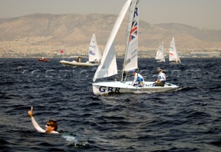 2004 OLYMPIC GAMES (PHOTO: LEO MASON):. end of 470 races Kevin Burnham wins gold ahead of brits