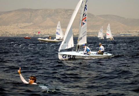 2004 OLYMPIC GAMES PHOTO LEO MASON end of 470 races Kevin Burnham wins gold ahead of brits