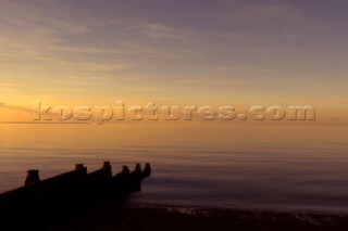 Breakwater on a still day  Whitstable Beach Kent