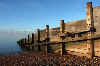 Breakwater on a still day  Whitstable Beach Kent