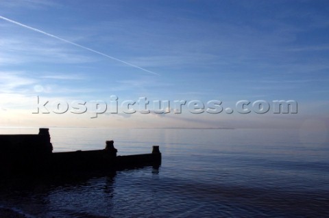 Breakwater on a still day  Whitstable Beach Kent