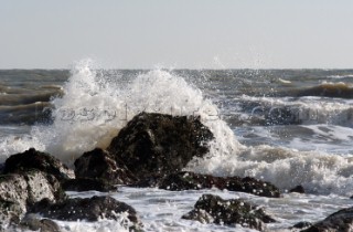 Wave crashes over rock on St Margarets Bay, Dover Kent