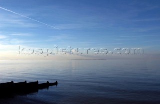 Breakwater on a still day  Whitstable Beach Kent