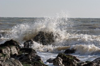 Wave crashes over rock on St Margarets Bay, Dover Kent