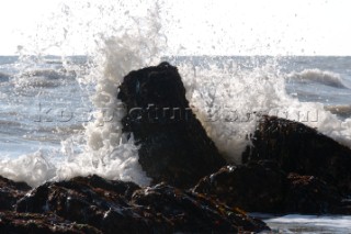 Wave crashes over rock on St Margarets Bay, Dover Kent