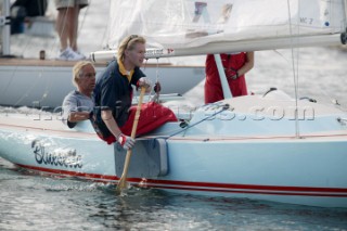 Paddling a Dragon yacht into port