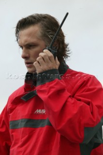 Man using an ICOM VHF handheld radio