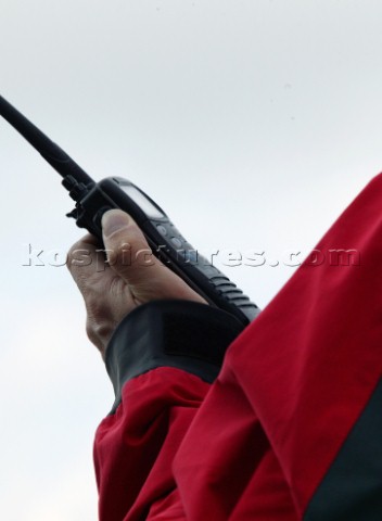 Man using an ICOM VHF handheld radio