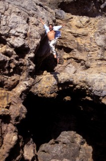 Musto man jumping from a high cliff in Majorca