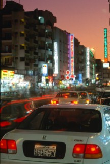 Busy street at night, Dubai - United Arab Emirates.