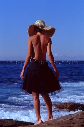Girl in Hat on rock Austrlia