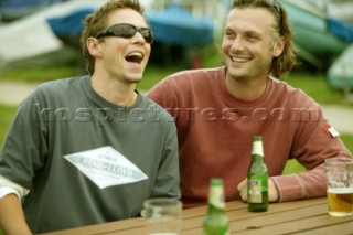 Two friends enjoying a beer