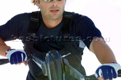 Crew member on coffee grinder winches