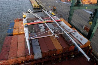 G Class catamaran Cayenne on a container ship in the Port of Antwerp, Belgium