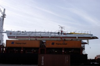 G Class catamaran Cayenne on a container ship in the Port of Antwerp, Belgium