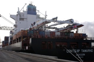 G Class catamaran Cayenne on a container ship in the Port of Antwerp, Belgium