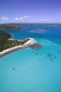 Idyllic beach on the clear shallow waters of the Caribbean