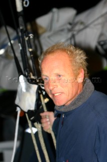 A relieved sailor Mike Golding on the Open 60 Ecover arriving in Les Sables dOlonne in France at the end of the Vendee Globe 2004/2005 after his keel fell off the yacht 52 miles from the finish