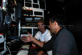 Skipper David Scully and navigator Woeter Verbraak at nav station on Cheyenne