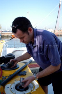 Lewmar employee fixing winch on Cheyenne