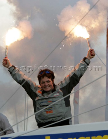 Ellen MacArthur of trimaran BQ winning the round the world solo sailing record of 71 days 14 hours a