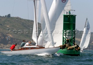 Boats rounding a navigation bouy