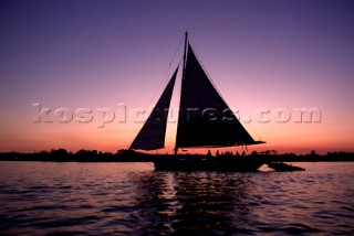 Classic cat rig at sunset.