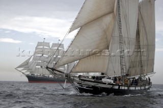 Two tall ships under way