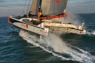 Arrival of maxi cat Orange skippered by Bruno Peyron in Brest at the end of the successful Jules Verne 2005 setting a new round the world record time of 50 days, 16 hours, 20 mins and 4 secs!