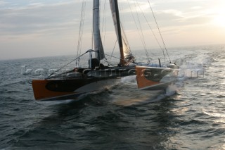 Arrival of maxi cat Orange skippered by Bruno Peyron in Brest at the end of the successful Jules Verne 2005 setting a new round the world record time of 50 days, 16 hours, 20 mins and 4 secs!