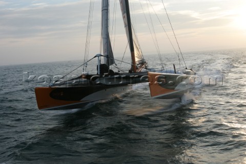 Arrival of maxi cat Orange skippered by Bruno Peyron in Brest at the end of the successful Jules Ver