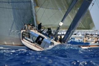 Wally yacht Tiketitan tacking towards another maxi racing yacht