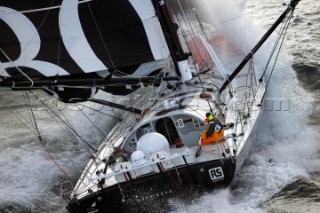 Vendee Globe Open 60 yacht Hugo Boss skippered by Alex Thomson powering through rough seas in strong winds