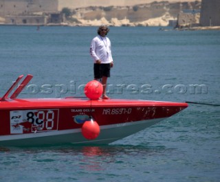 P1 Malta 2005. Powerboat mooring up with fenders.