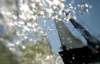 Volvo Ocean Race 2005-2006. Spray surrounding Telefonica Movistar - Volvo 70 Canting ballast swing keel