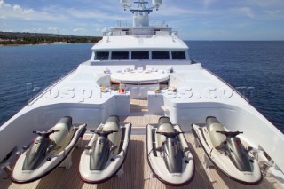 Jet skis lined up on foredeck of superyacht