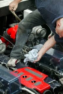 Man checking engine oil level at the Powerboat P1 World Championships 2005 - Travemunde, Germany