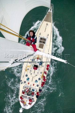 Simon Le Bon climbing the mast of Arnold Clarke Drum before the start of the Rolex Fastnet Race 2005