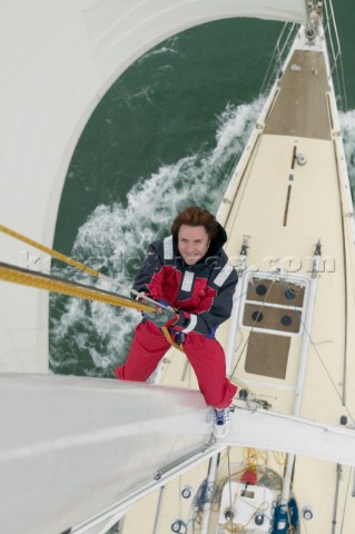 Simon Le Bon climbing the mast of Arnold Clarke Drum before the start of the Rolex Fastnet Race 2005