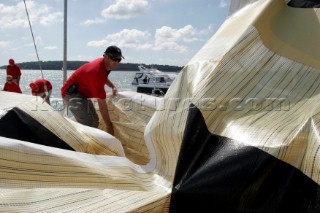 Changing sails onbaord Arnold Clarke Drum at the start of the Rolex Fastnet Race 2005