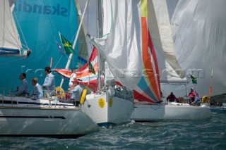 Boats tacking through fleet at the start of the Rolex Fastnet Race 2005