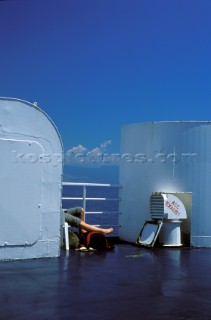 Backpacker on ferry in the Mediterranean