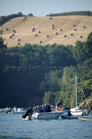 Boats moored on Devon coastline