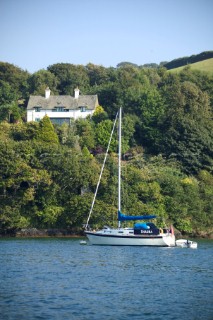 Yacht moored off Devon coast near Dartmouth