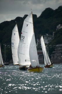 Fleet of classic yawls racing in Dartmouth, UK