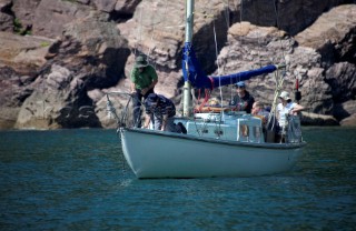 Pulling up the anchor on a small cruising yacht