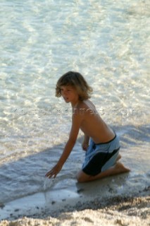 Boy playing on beach